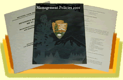 Stack of booklets, topped with  Management Policies 2001 illustrated by large NPS arrowhead.