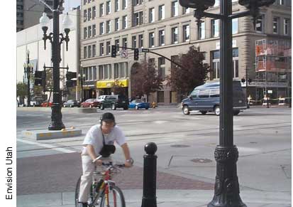 Envision Utah promotes multiple transportation options, accommodating bicyclists on busy urban streets as well as pedestrians, motorists, and users of public transportation.