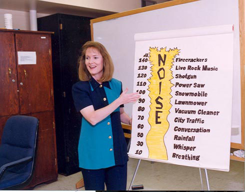 Woman at display board 