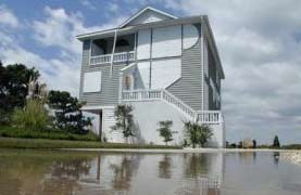 An elevated house that did not experience damage from flood waters