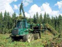 Picture of a John Deere bundling machine in action.