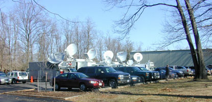 Sattelite trucks lined up for news coverage during the Tony Blair - President Bush press event.