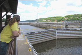 A visitor views the lock at Lock and Dam 2 on the Mississippi River.