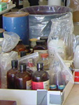 Photo: Boxes with bottles and other containers with chemicals