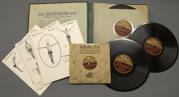 A sample miniature record and chart featuring 'the grasp' and a personal development chart with overlays describing the beneficial effects of the twelve exercises.