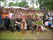 LCDR Aimee Treffiletti, Senior Airman Walker, LT Nazmul Hassan, and LCDR Stephen Piontkowski at a welcoming ceremony at one of the schools where they collected water samples.