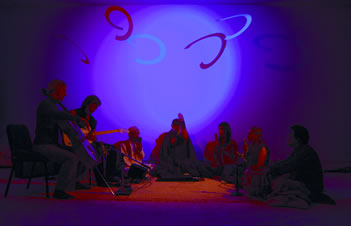 Dream House, 1962–present, by La Monte Young and Marian Zazeela; La Monte Young, Marian Zazeela, and The Just Alap Raga Ensemble performing “Raga Sundara, ektal vilampit khayal” by La Monte Young in Raga Yaman Kalyan in a setting of Imagic Light, June 27, 2008. Dream House: Seven + Eight Years of Sound and Light, 275 Church Street, New York. Courtesy MELA Foundation, New York —Jung Hee Choi, © Jung Hee Choi