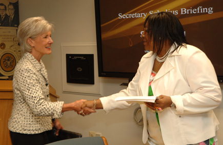 Before beginning the meeting, Secretary Sebelius went around the room to meet the team of leaders working on the outbreak response. (HHS Photos by Chris Smith)