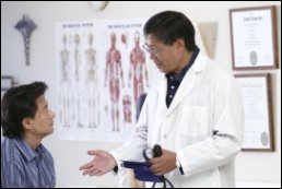 A doctor talking to a patient.