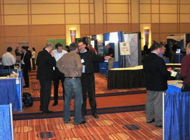 During session breaks, attendees gathered in the exhibit hall, where over 40 booths were displayed.