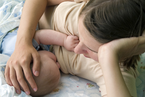 woman and with infant breastfeeding