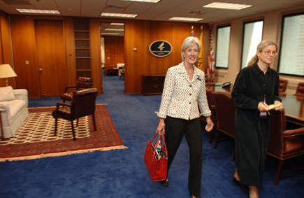 Secretary Sebelius and Chief of Staff Laura Petrou depart HHS for the White House. There, the Secretary attended a briefing on the latest news about the virus. (HHS Photos by Chris Smith)