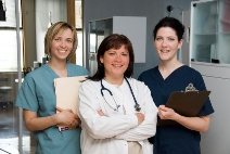 Picture of three clinicians in a provider setting