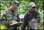 photo thumbnail: LT Nazmul Hassan and USAF personnel at one of the internally displaced persons centers in Papua New Guinea.