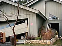 Photo of home destroyed by earthquake.