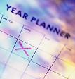 Close-up of a cross marked on a year planner
