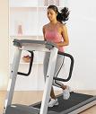 Woman running on a treadmill at home