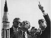 Dr. Wernher von Braun explains the Saturn Launch System to President John F. Kennedy. NASA Deputy Administrator Robert Seamans is to the left of von Braun.