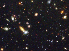 Several hundred never before seen galaxies are visible in this "deepest-ever" view of the universe, called the Hubble Deep Field (HDF) in 1996.