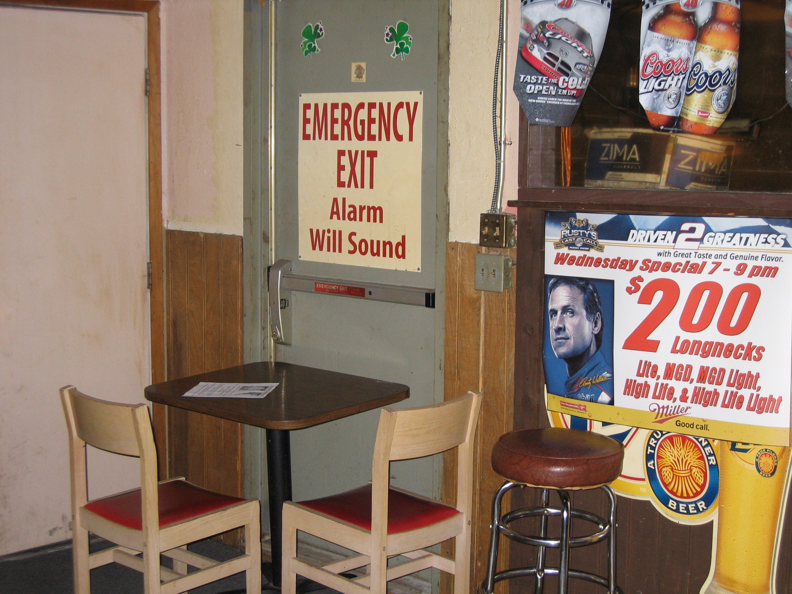 chairs and table blocking exit door