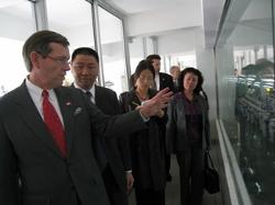 November 20, 2008 – U.S. Secretary of Health and Human Services (HHS) Michael O. Leavitt tours the Luye Fisheries Aquatic Farms, outside of Guangzhou, Guangdong Province, in the People's Republic of China. Secretary Leavitt was in China to open the first offices of the HHS Food and Drug Administration (FDA) outside of the United States; HHS/FDA is now working out of three locations in China, the U.S. Embassy in Beijing and the U.S. Consulates General in Guangzhou and Shanghai. (Photo Credit: Bill Steiger, HHS)