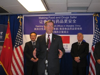 November 21, 2008 – U.S. Secretary of Health and Human Services (HHS) Michael O. Leavitt presides over  the ceremony for the opening of the offices of the HHS Food and Drug Administration (FDA) in Shanghai, in the People's Republic  of China. To the left of the Secretary is Xu Jianguang, the Director of the Shanghai Municipal Health Bureau; to the right  of the Secretary is HHS/FDA Commissioner Andrew von Eschenbach, M.D. (Photo Credit: Bill Steiger, HHS)