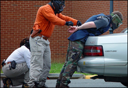 Photo of agents conducting mock arrest exercise