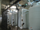 Photo of six, 1000 gallon cisterns in basement of EPA West.