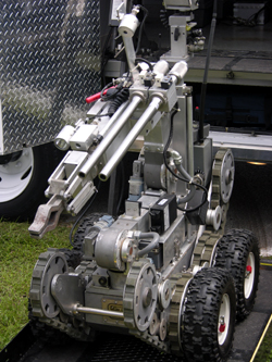 A Miami police robot like this one destroyed an improvised explosive device with streams of water during the exercise.