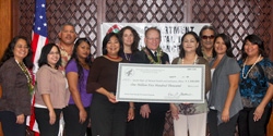 Photo of Dr. Broderick with staff members of Guam’s Department of Mental Health and Substance Abuse