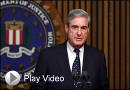 Director Mueller speaks at the press conference
