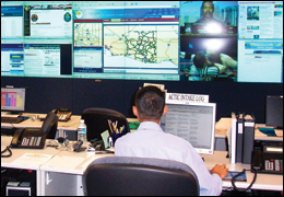 An employee at his station in the Arizona Counter Terrorism Information Center (ACTIC), Arizona’s fusion center.