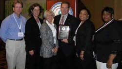 2006 Citizen Excellence in Community Involvement Award presentation. Pictured left to right: Peter Osborne - ORSSAB; Suzanne Wells - EPA; Heather Cothron - 
    ORSSAB; Kerry Trammell - ORSSAB; Constance Jones - EPA; Karen Martin - EPA