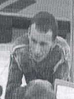 Photograph of Unknown Suspect - Bank Surveillance Photograph