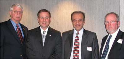 photo of (left to right) Jim Haveman, SAMHSA Administrator Charles Curie; Dr. Sabah Sadik, and Jon Wilkes