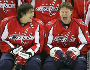 Alex Ovechkin, left, jokes with teammate and countryman Alexander Semin during a team portrait session. (AP Images)