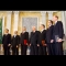 Seven men posing for camera (NATO)