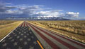 An American flag painted on a highway