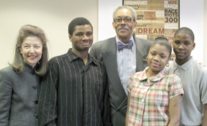 Maryland Chief Judge Robert M. Bell, center, stands with (from left to right) LSC President Helaine M. Barnett, and Annapolis Road Academy students James Stapleton, Ebony Milligan and Michael McComb.