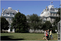 Building with group of people in front (AP Images)