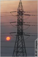 Electric tower with power lines attached (AP Images)