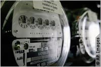 Close-up of two electric meters (AP Images)