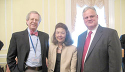 LSC Board Chairman Frank B. Strickland, left, stands with LSC President Helaine M. Barnett, and Michael J. Kurtz, an Assistant Archivist for the National Archives and Records Administration.