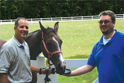 Marty Foil (left) with farm favorite, Shay Day, and Brendan, 22 (right)