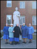[Photo: Daughters in front of the Motherhouse]