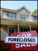 [Photo: foreclosure sign]