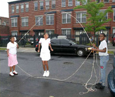 [Photo 1: Children jumping rope in the new Prospect Plaza (NYC) neighborhood]