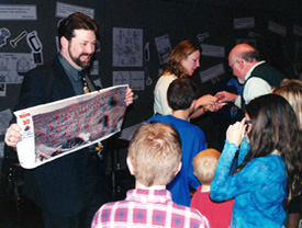 Image of a JPL speaker and audience.