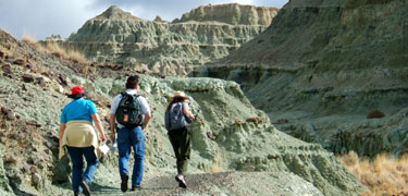 Image of a park ranger leading a tour into the blue basin.