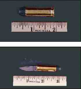 Photograph of example of knives that appear to be gun cartridges